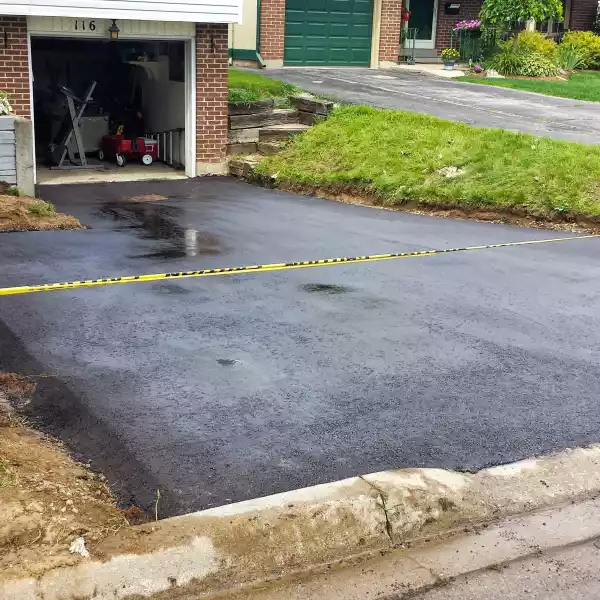 asphalt driveway sloped to drain in waterloo